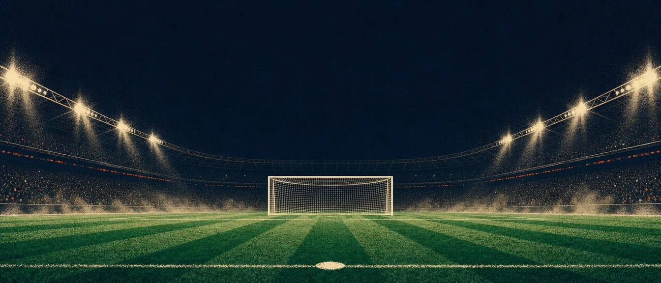 Empty goal under the floodlights of the Golden Goal stadium at night